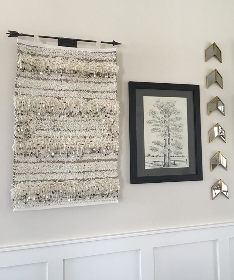 wall decor design with tapestry mirrors and photo frame