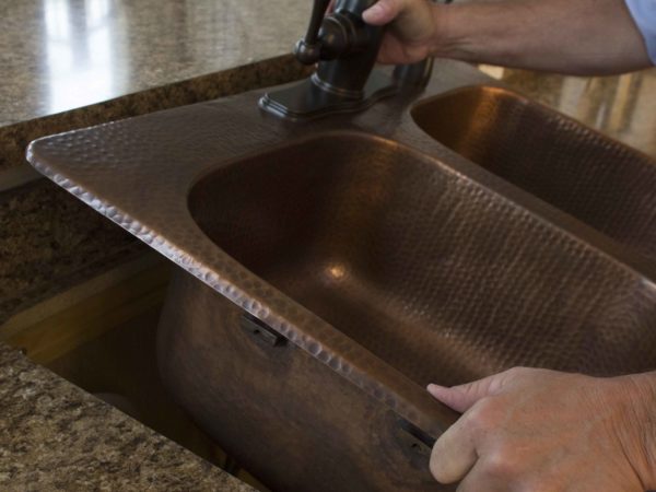 installing a copper sink into countertop
