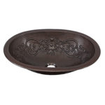 45 degree view of pauling undermount copper kitchen sink with scroll design embossment