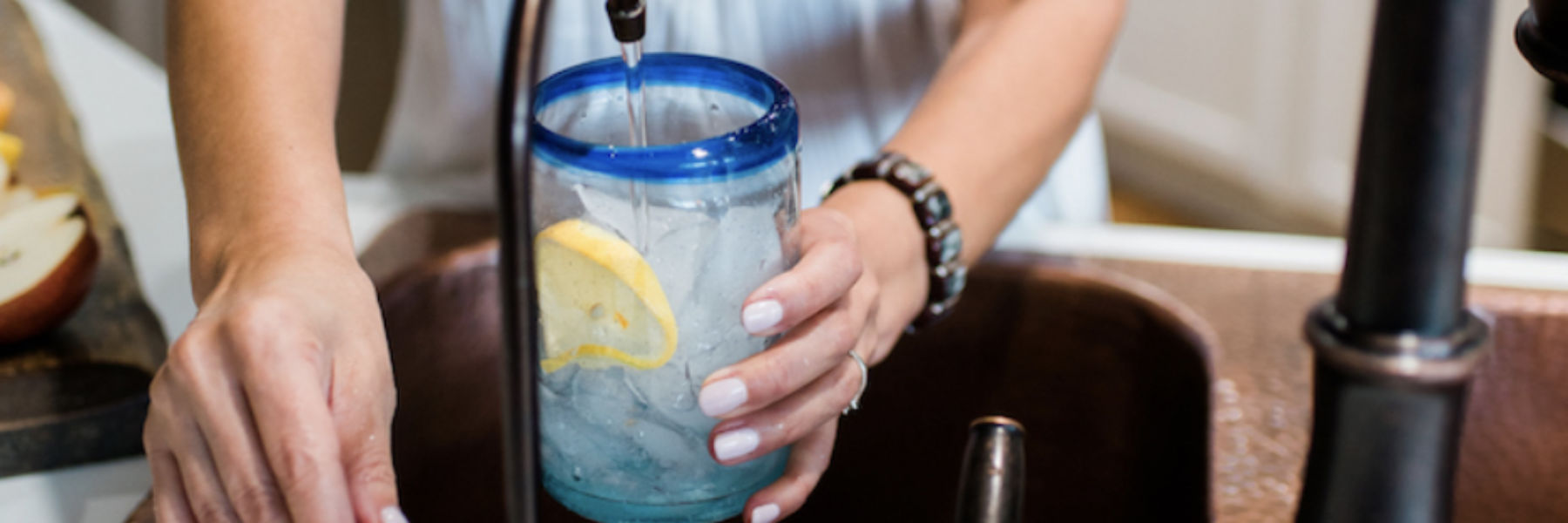 filling glass of water