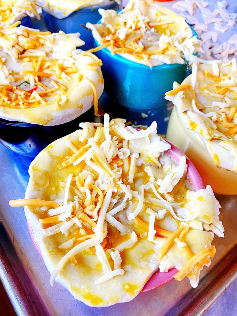 pre-baked puff pastry topped with grated cheese