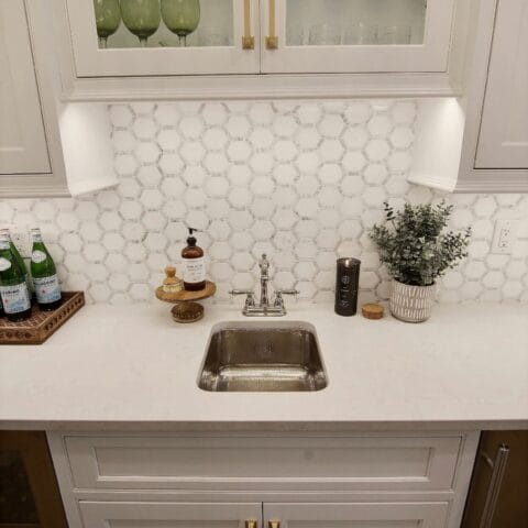 hand hammered stainless steel bar and prep sink.