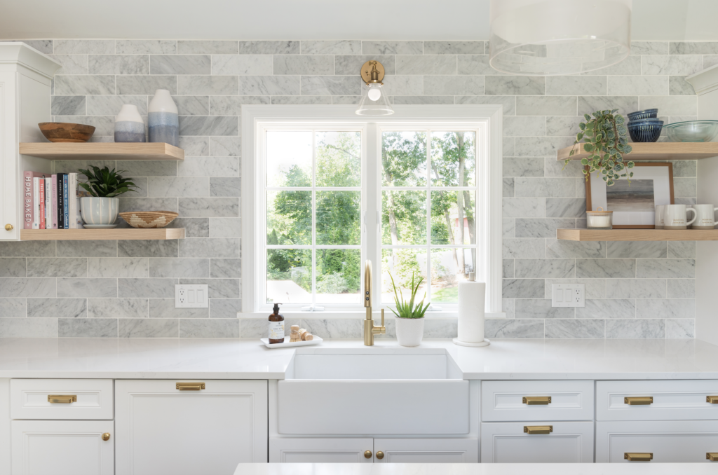 White farmhouse sink in a new clean kitchen