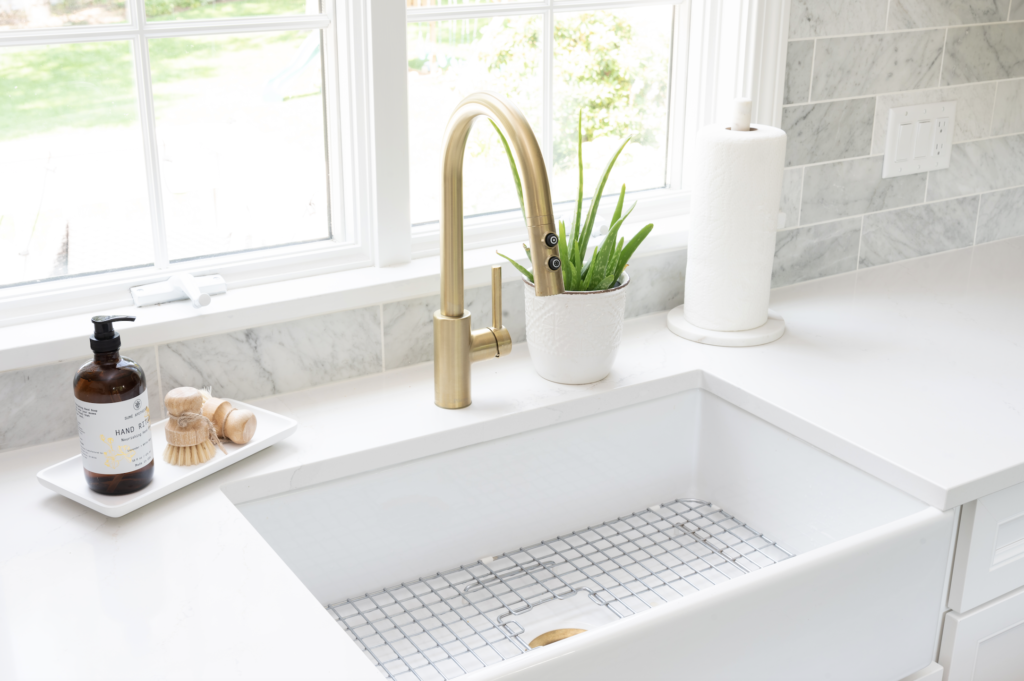 Turner White fireclay kitchen sink with gold faucet