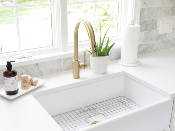 Turner White fireclay kitchen sink with gold faucet