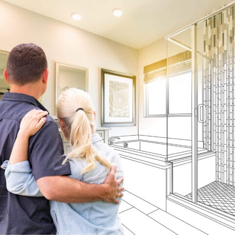 two people looking at ideas for renovating bathroom