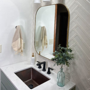 side shot of hawking copper bath sink in bathroom