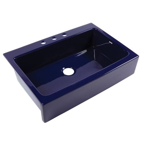 A glossy royal blue rectangular Quick-Fit® drop-in farmhouse sink made in fireclay with 3 faucet holes and a 3.5" drain hole.