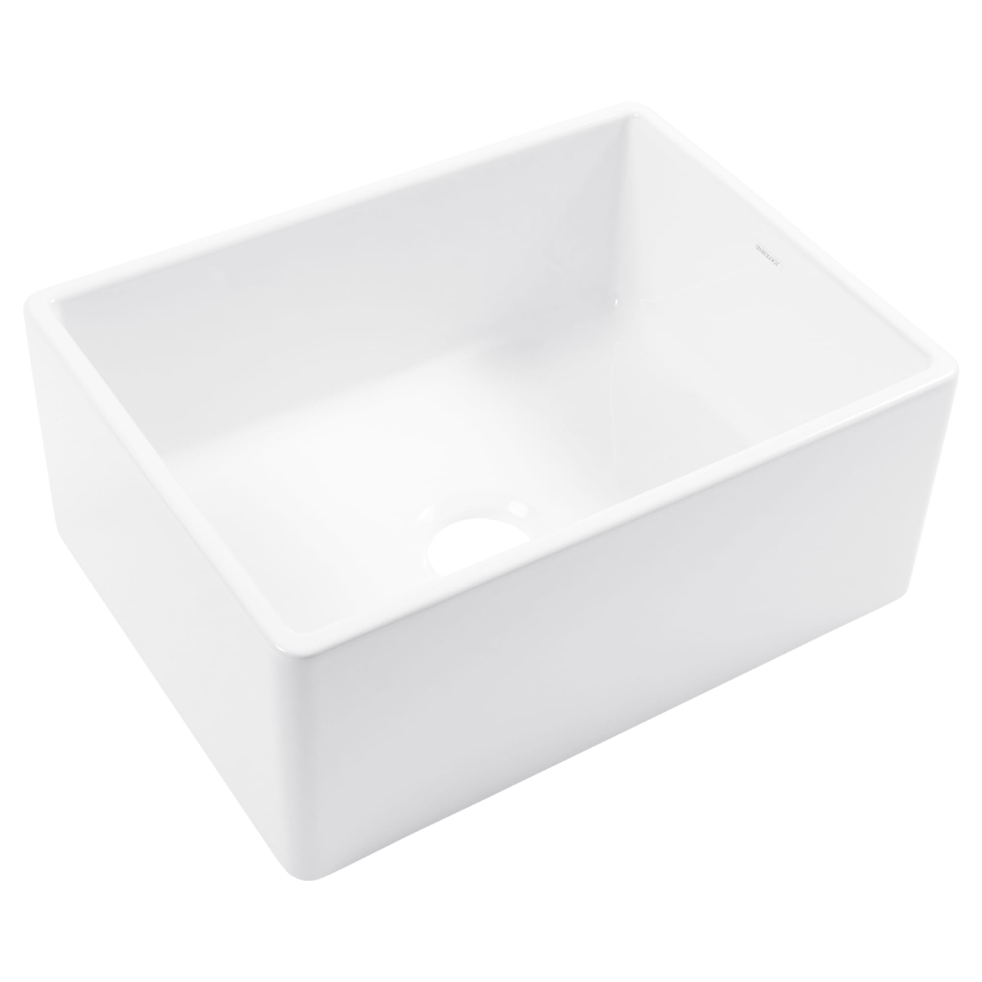 A white fireclay farmhouse kitchen sink.