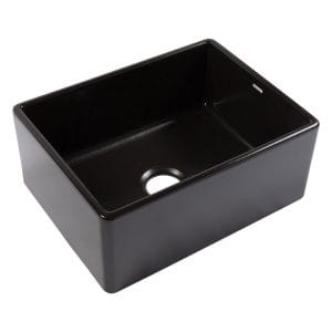A matte black fireclay farmhouse kitchen sink.