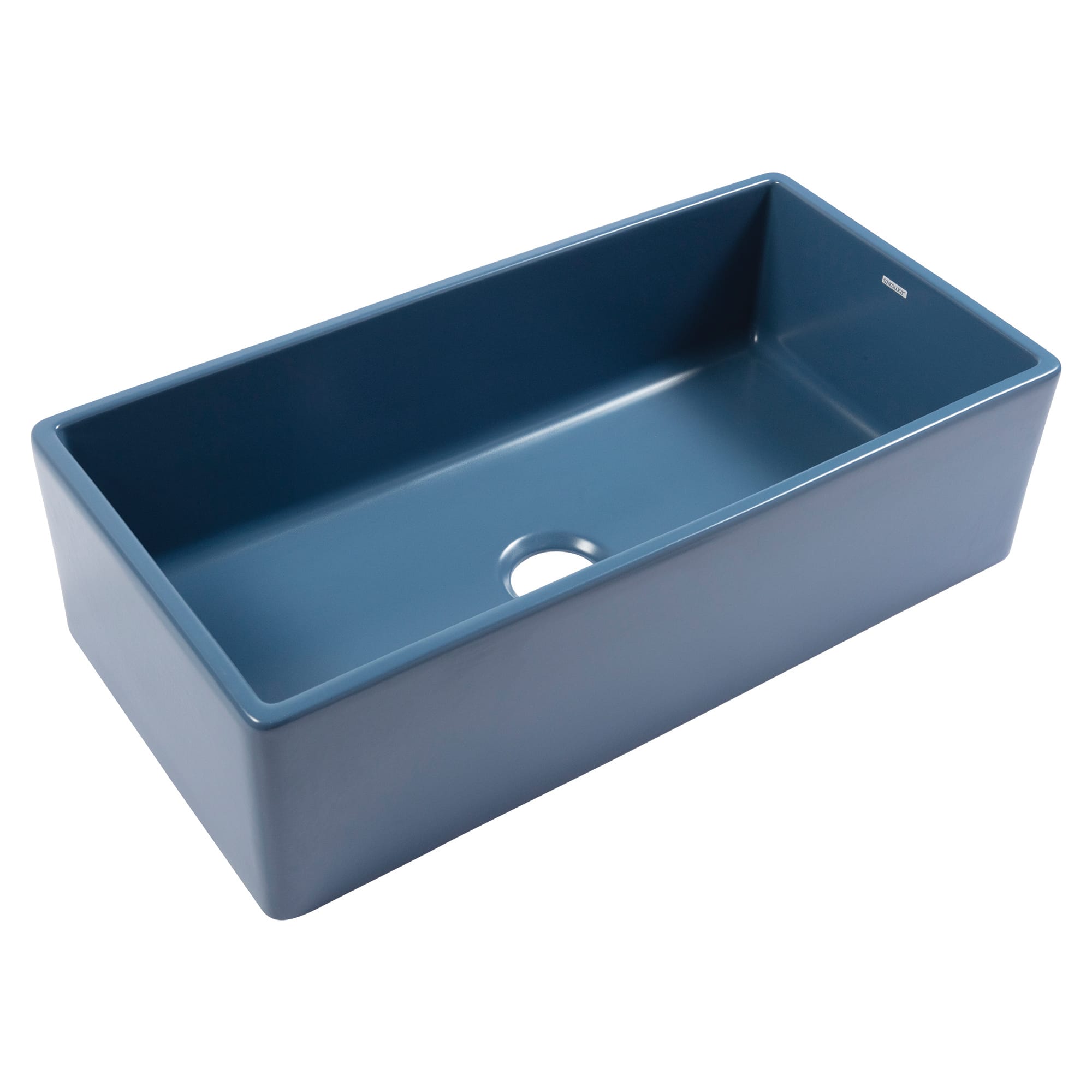 A matte blue fireclay farmhouse kitchen sink.