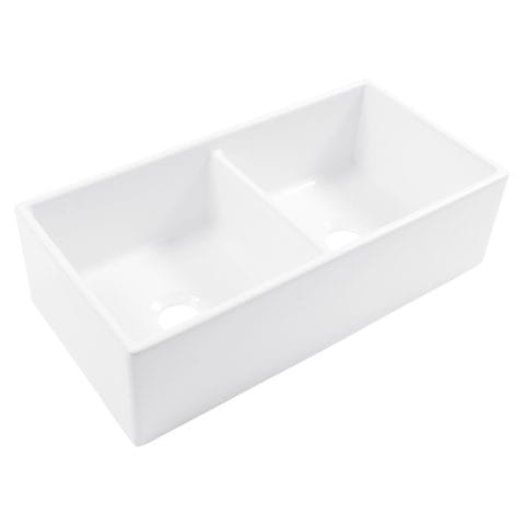 A glossy white rectangular double bowl undermount farmhouse sink made in fireclay.