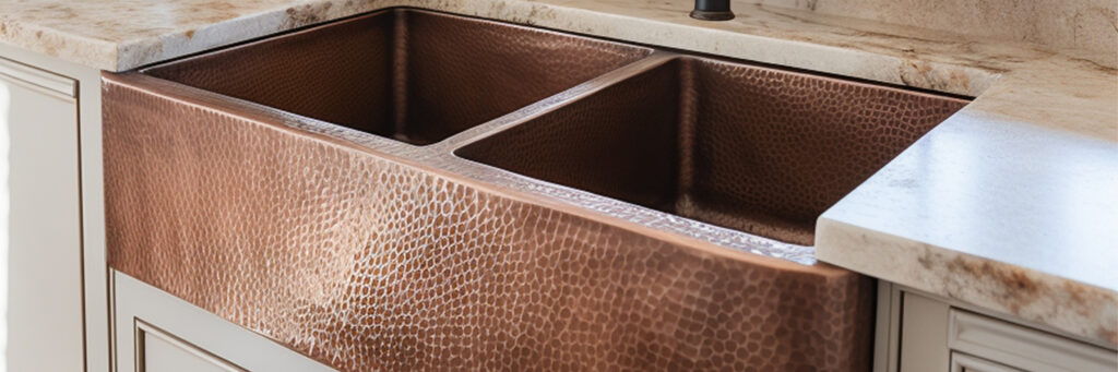a detailed close up photo of a copper kitchen sink