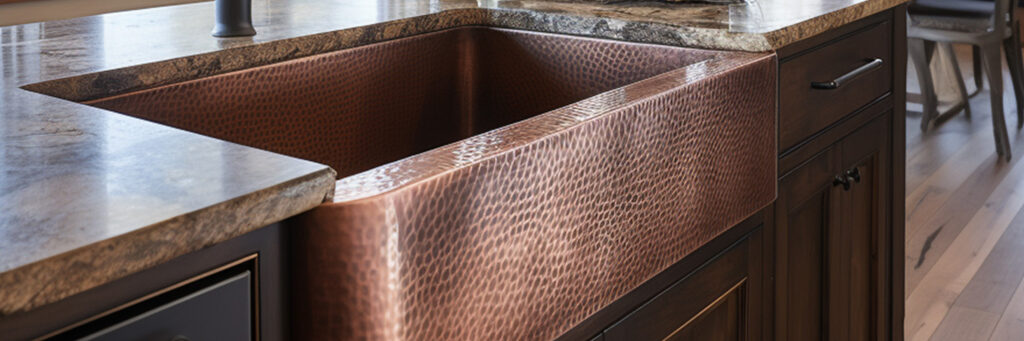 a detailed close up photo of a copper kitchen sink