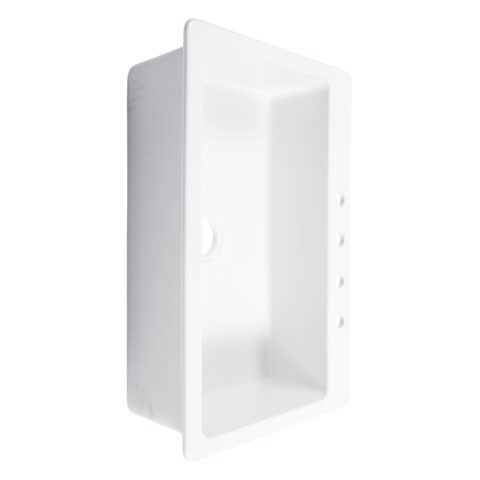 A white fireclay farmhouse drop-in kitchen sink.