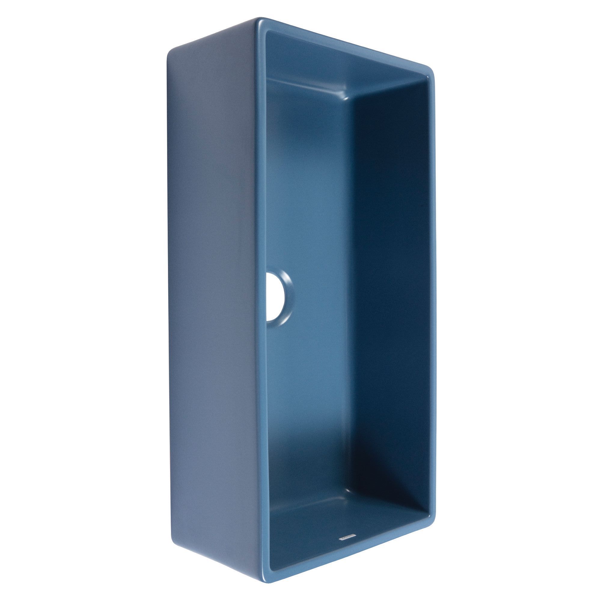 A matte blue fireclay farmhouse kitchen sink.