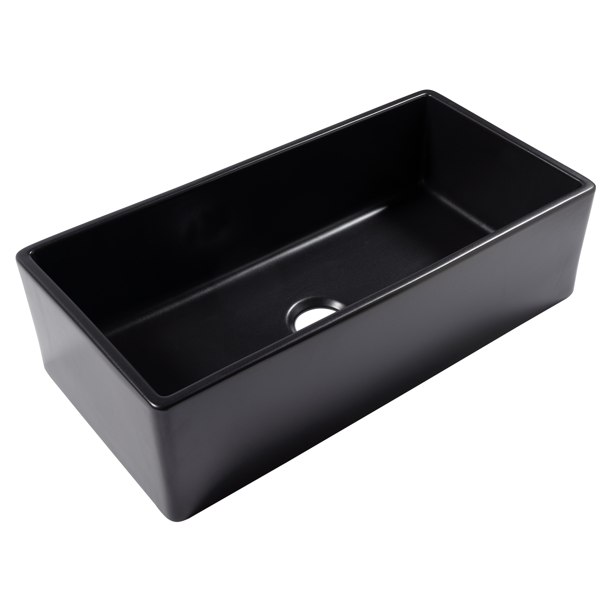 A matte black fireclay farmhouse kitchen sink.