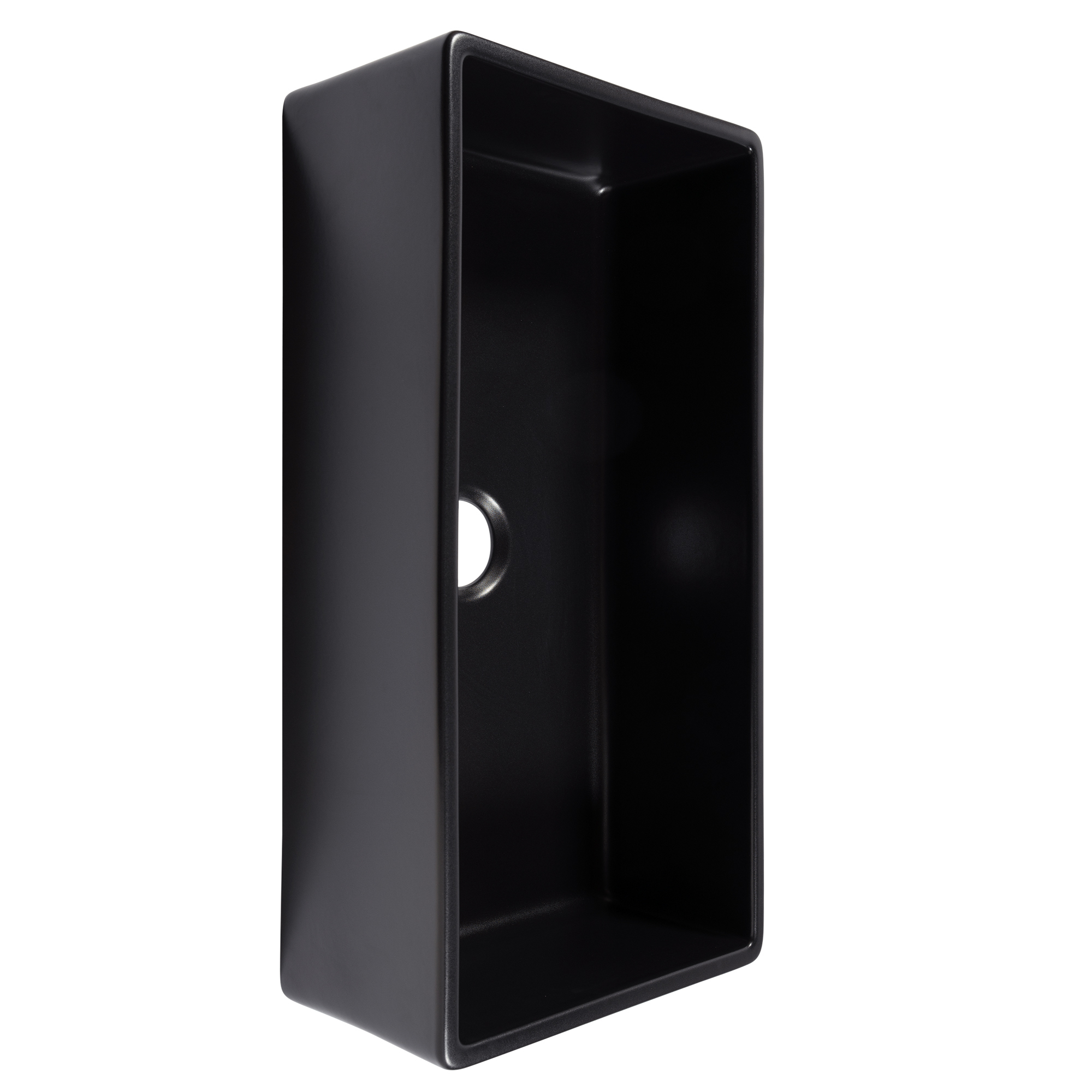A matte black fireclay farmhouse kitchen sink.