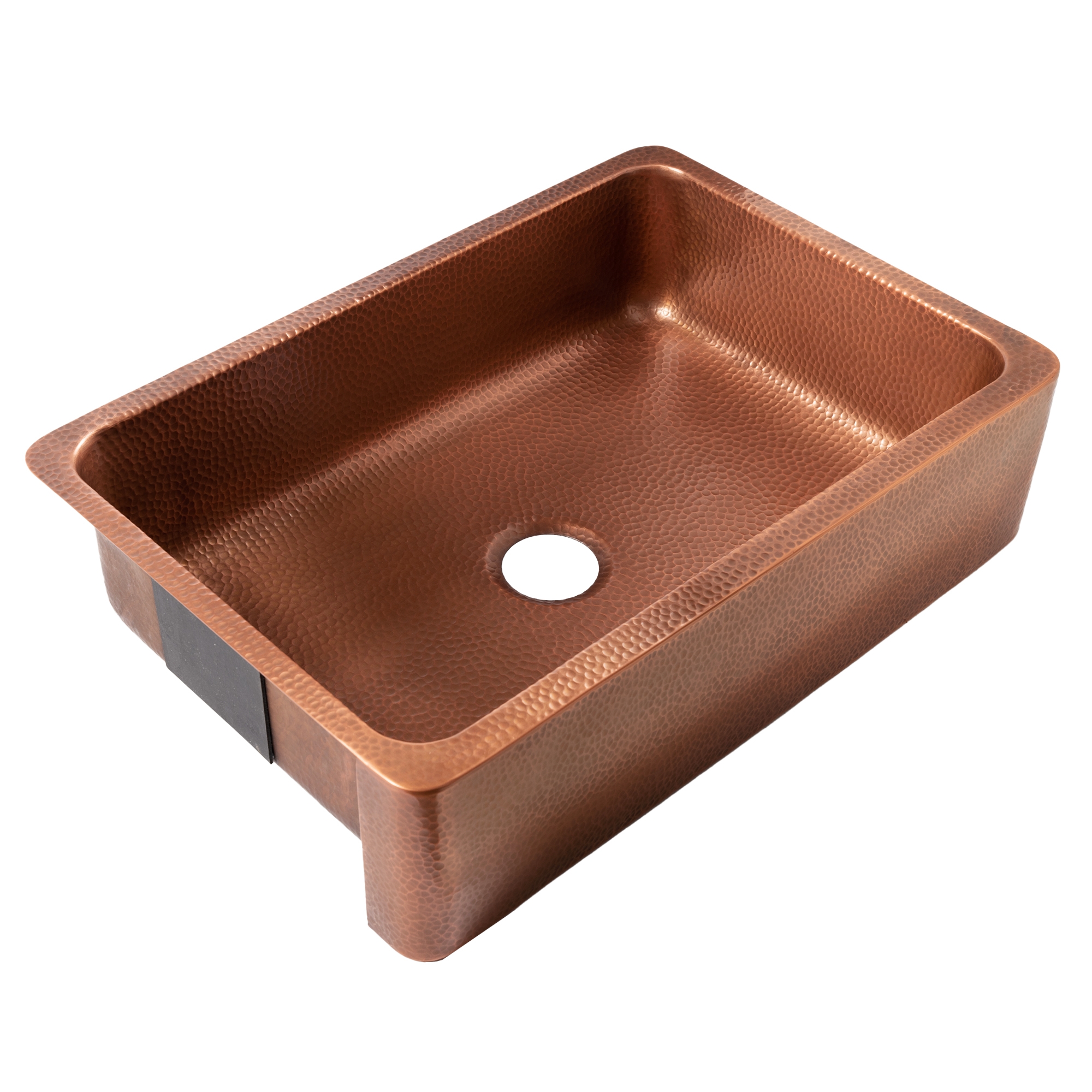 A copper rectangular undermount farmhouse sink.