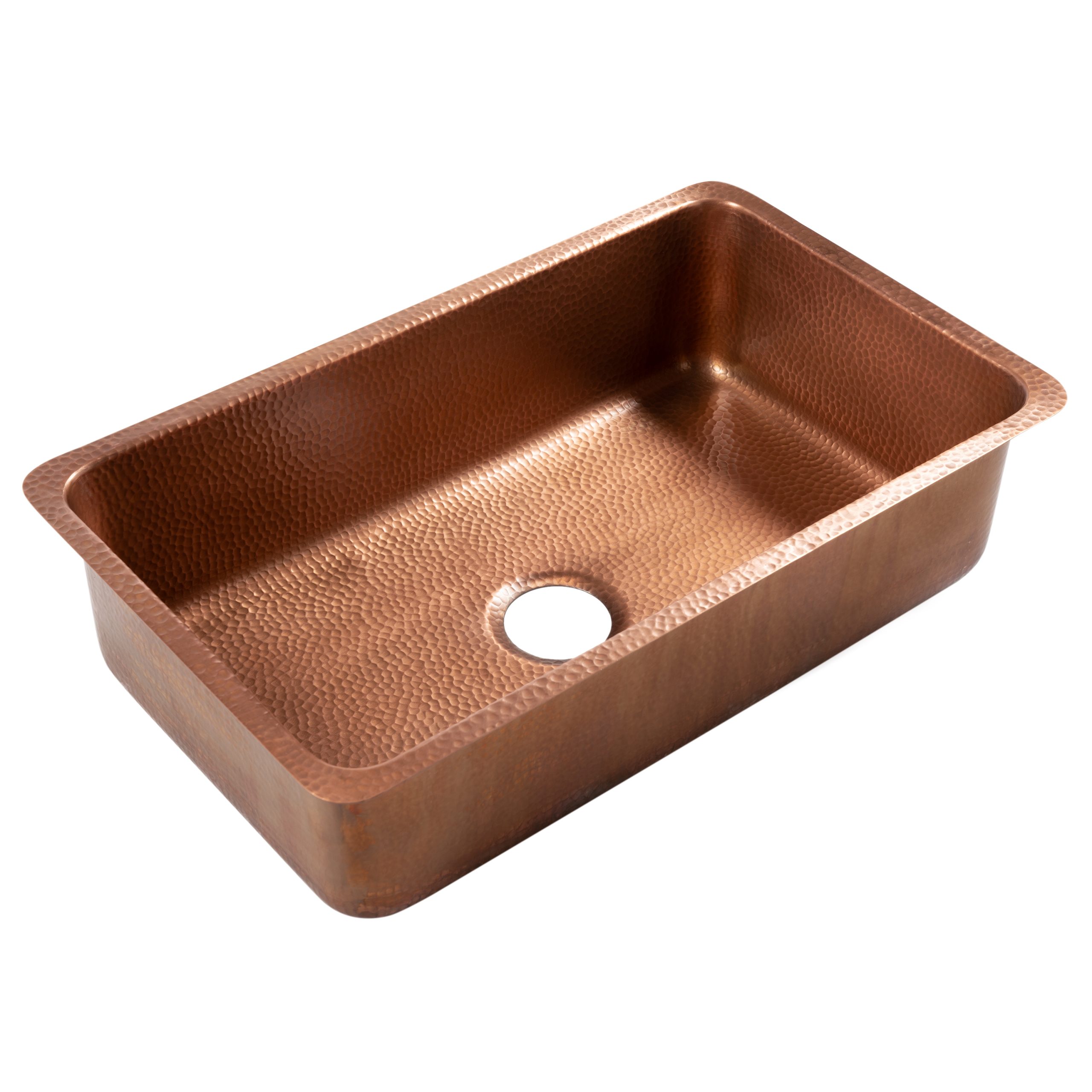 A copper rectangular undermount sink.