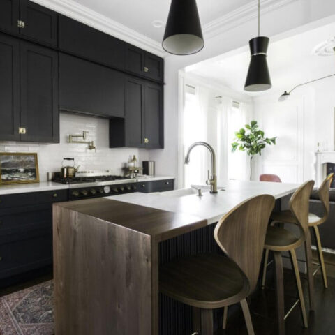a newly renovated dark blue kitchen
