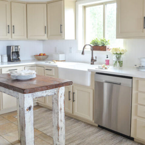 a farmhouse kitchen with a white fireclay sink