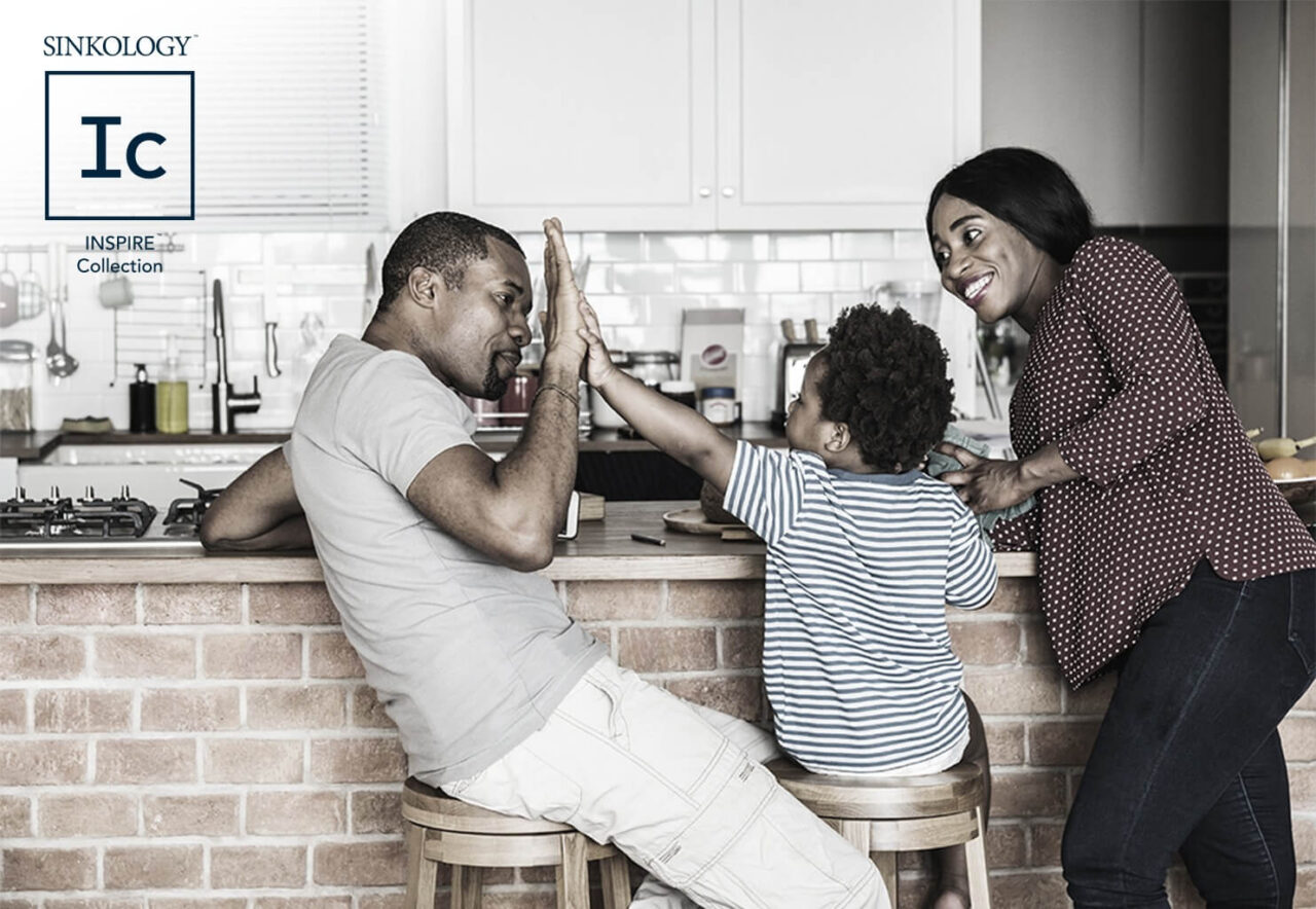 A happy family in the kitchen image with a "Sinkology Inspire Collection" logo in the top left corner.
