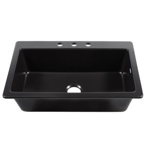 A matte black fireclay drop-in kitchen sink.