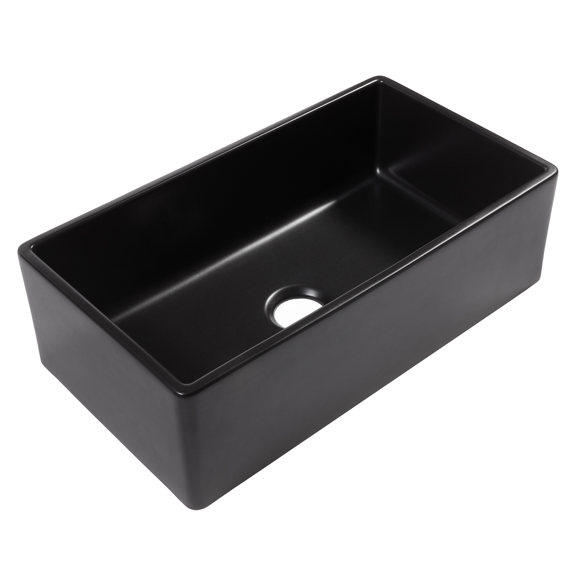 A matte black fireclay farmhouse kitchen sink.