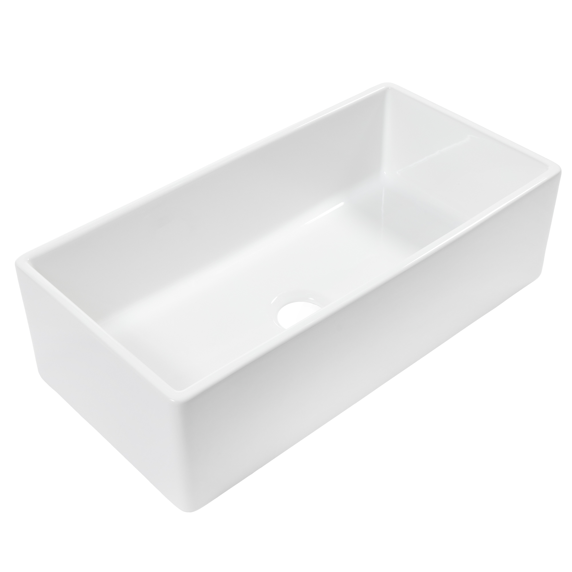 a large white fireclay kitchen sink