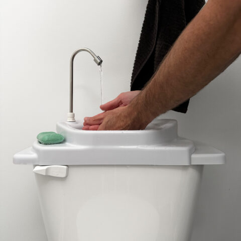GreenFlow Toilet Sink being used washing hands