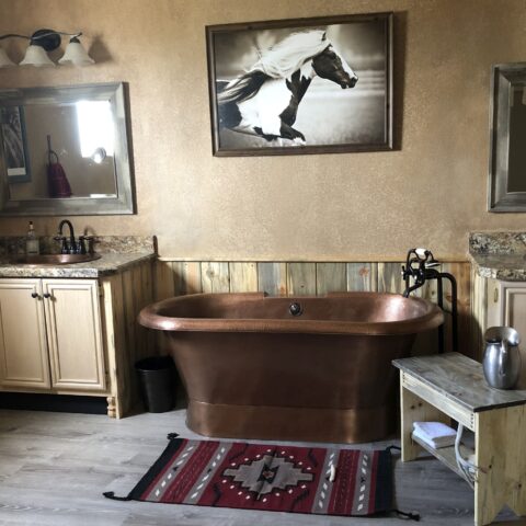 A hand hammered copper bath tub.