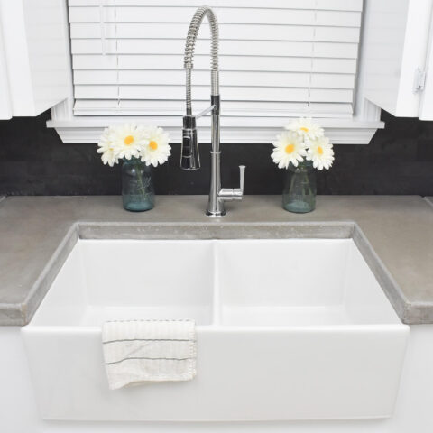 a double basin fireclay kitchen sink