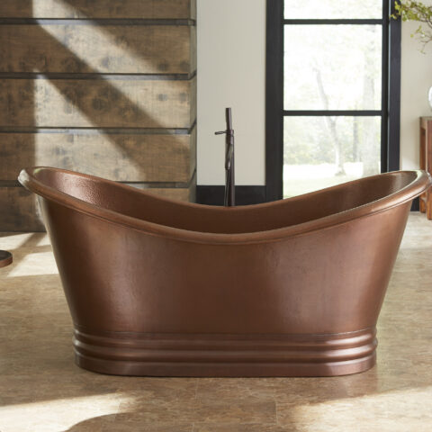 A hand hammered copper bath tub.