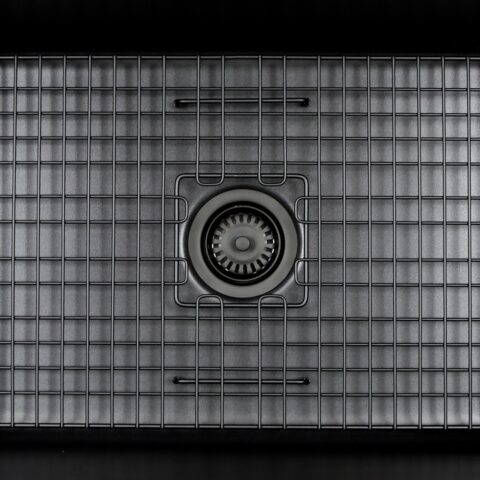 A matte black kitchen sink disposal drain.
