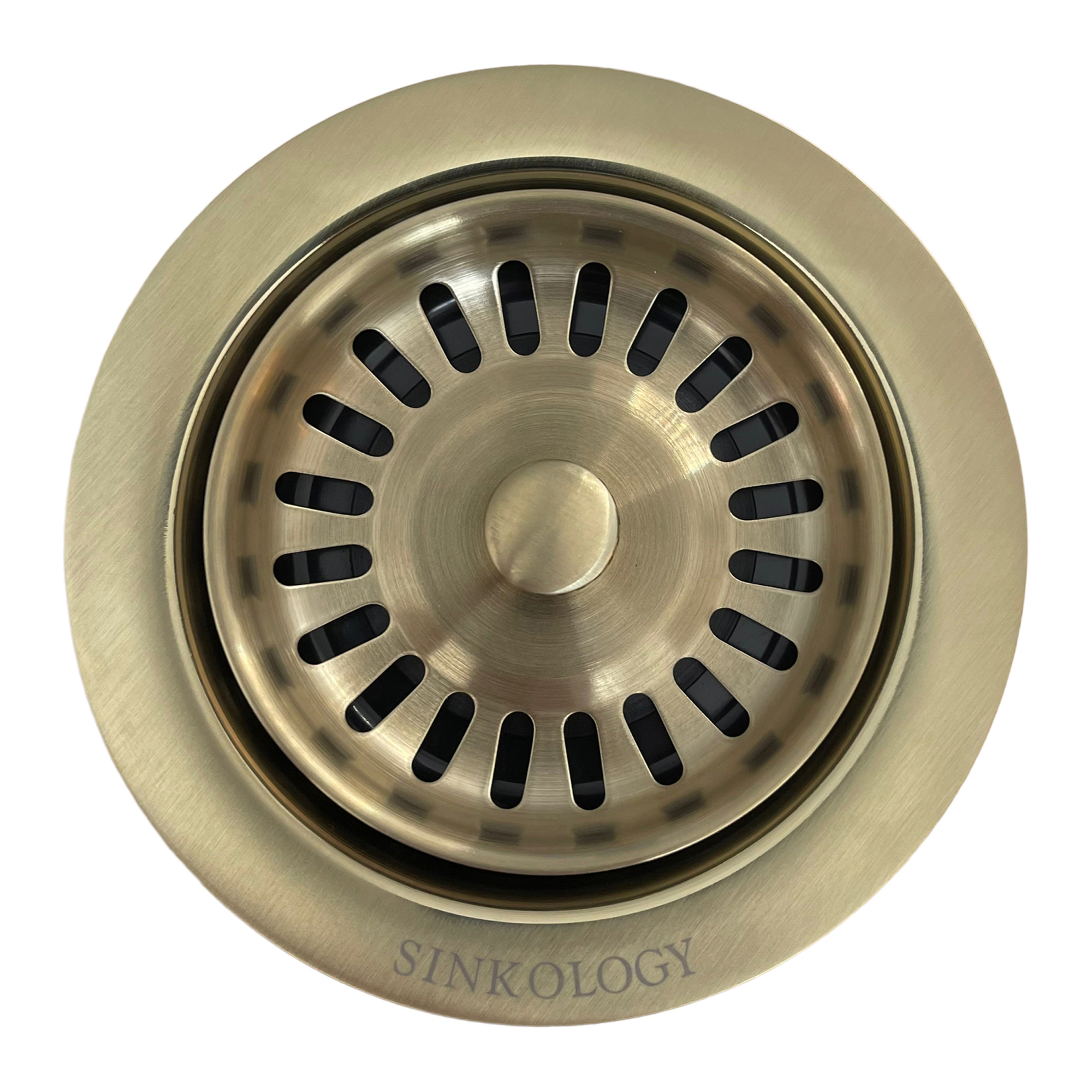 A polished brass sink drain collar with the brand name "Sinkology" engraved on the outer rim.