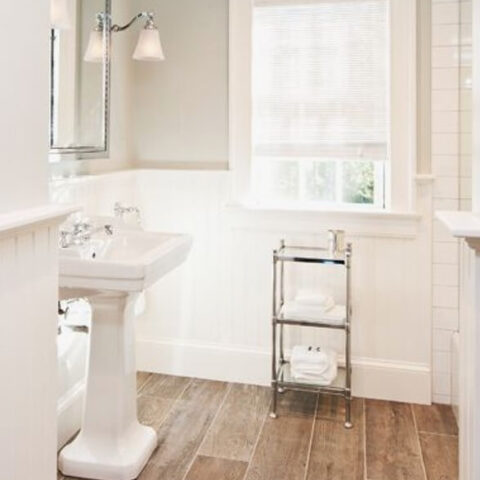 a bathroom with wood tiles