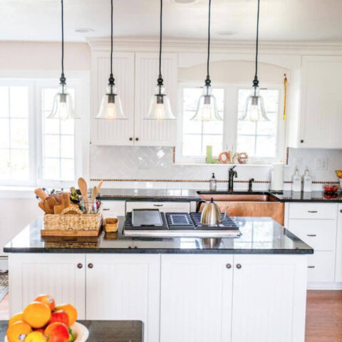 a kitchen with a copper sink
