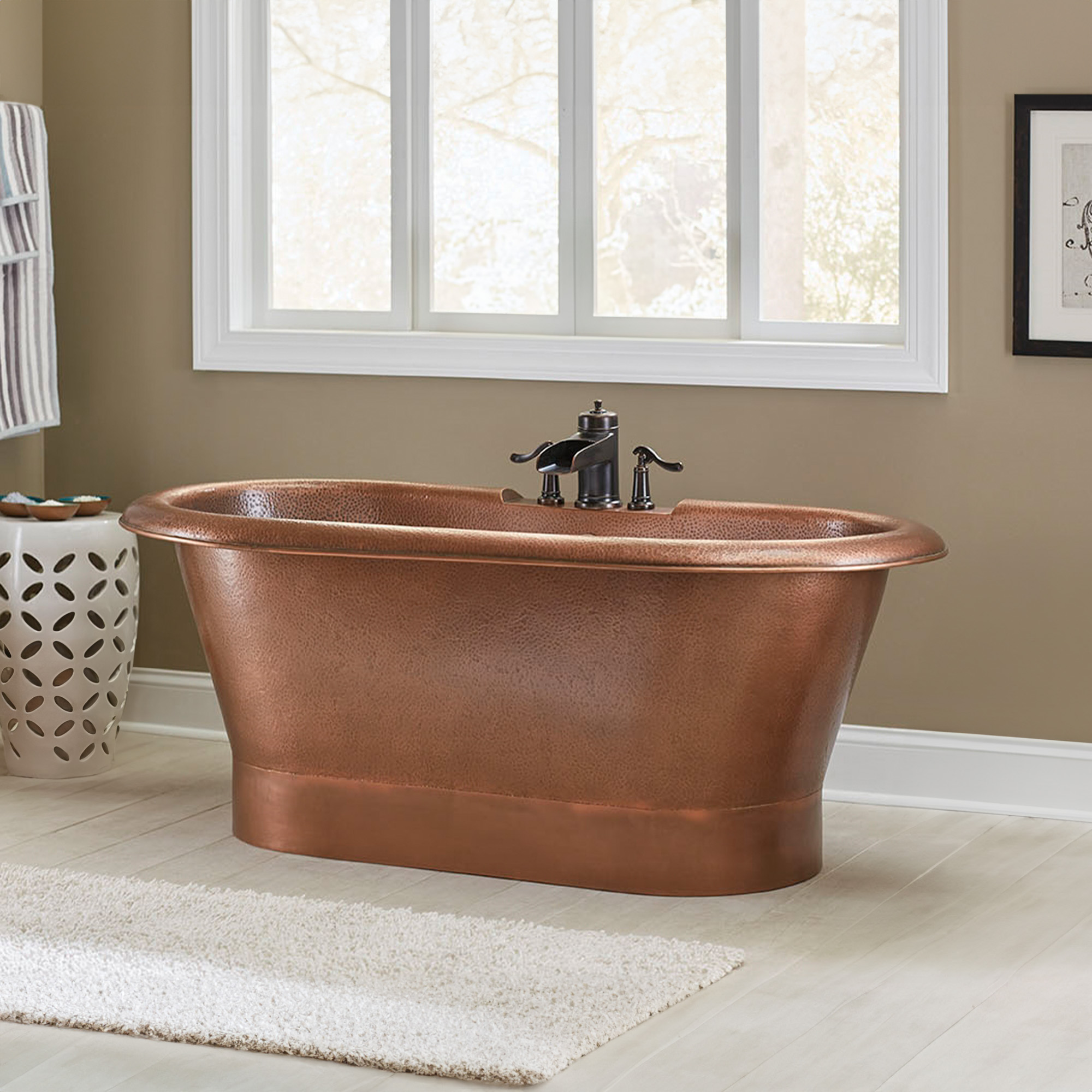 A hand hammered copper bath tub.