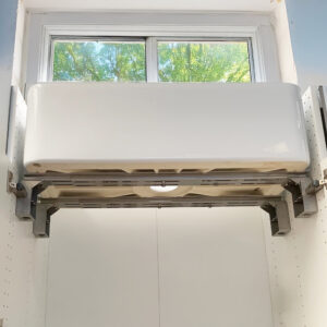 Level-Up™ Undermount Sink Support installed in cabinet with heavy farmhouse sink